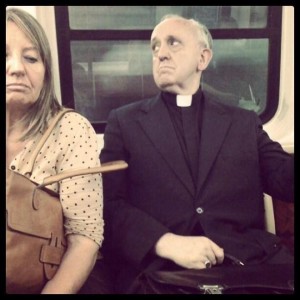 Papa Bergoglio, che ha indetto il "Giubileo della Misericordia", in tram quand'era cardinale